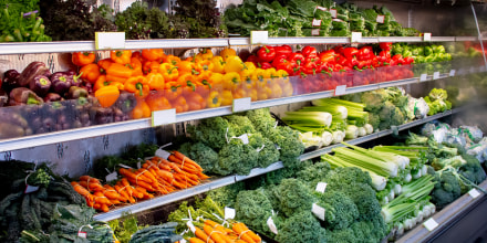 A view of a fresh vegetable display at a local grocery store.